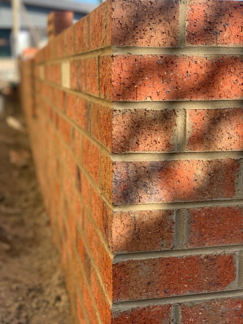 Bricklayers Warana Team is continuing this brick fence installation project by Sunshine Coast Bricklayers