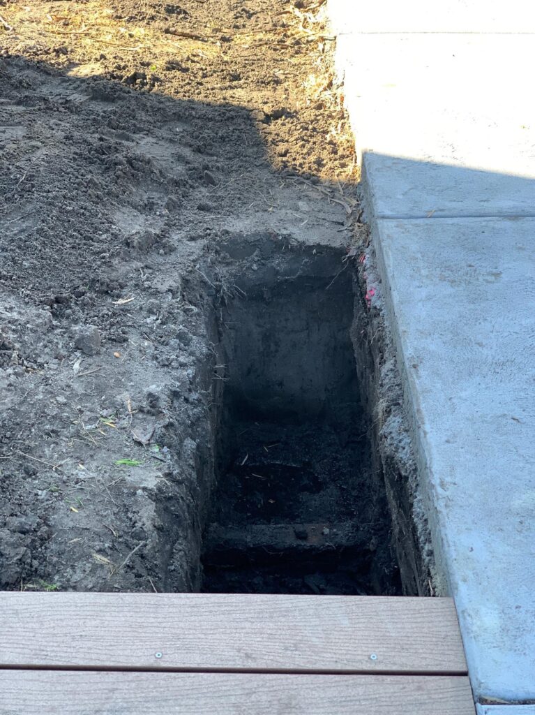 Footing trench prepared for a brick and block fence on the Sunshine Coast