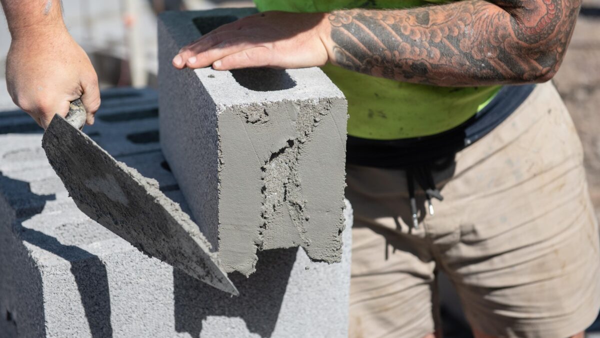 Bricklayer repairing and rebuilding blockwork on the Sunshine Coast