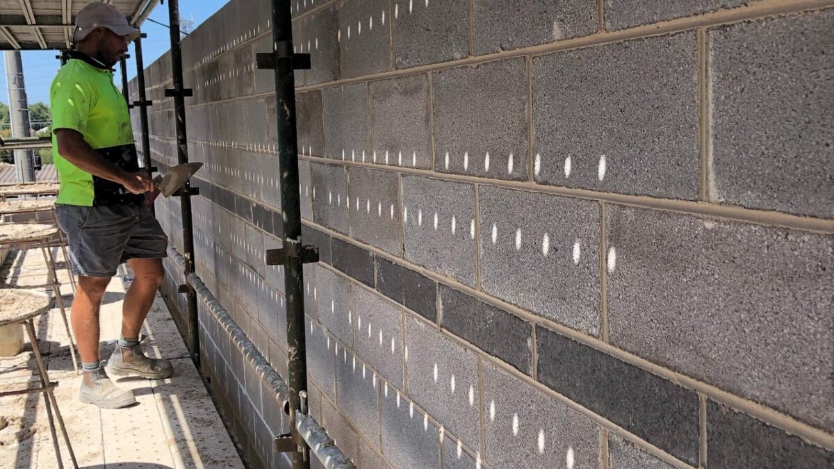 Long concrete block wall built by Sunshine Coast bricklayers