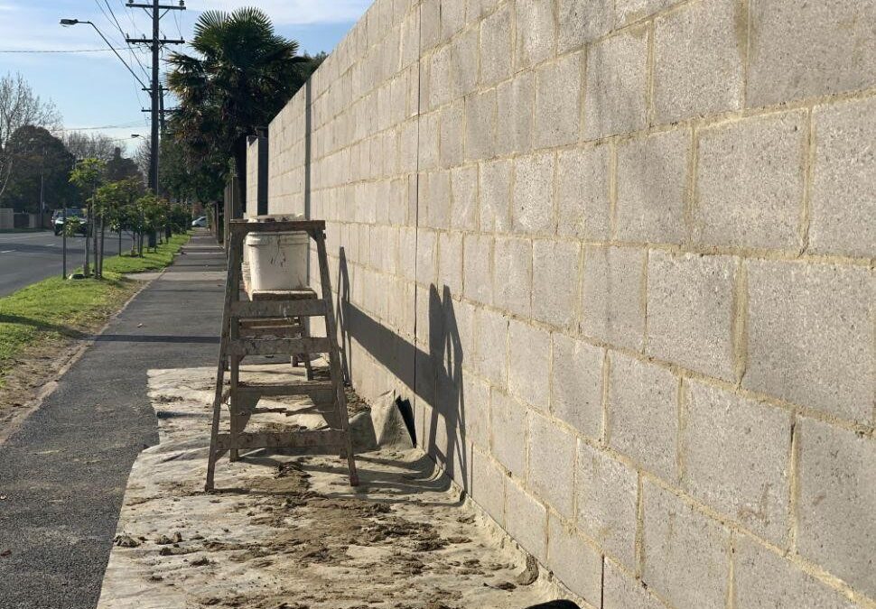 Solid block fence being built on the Sunshine Coast
